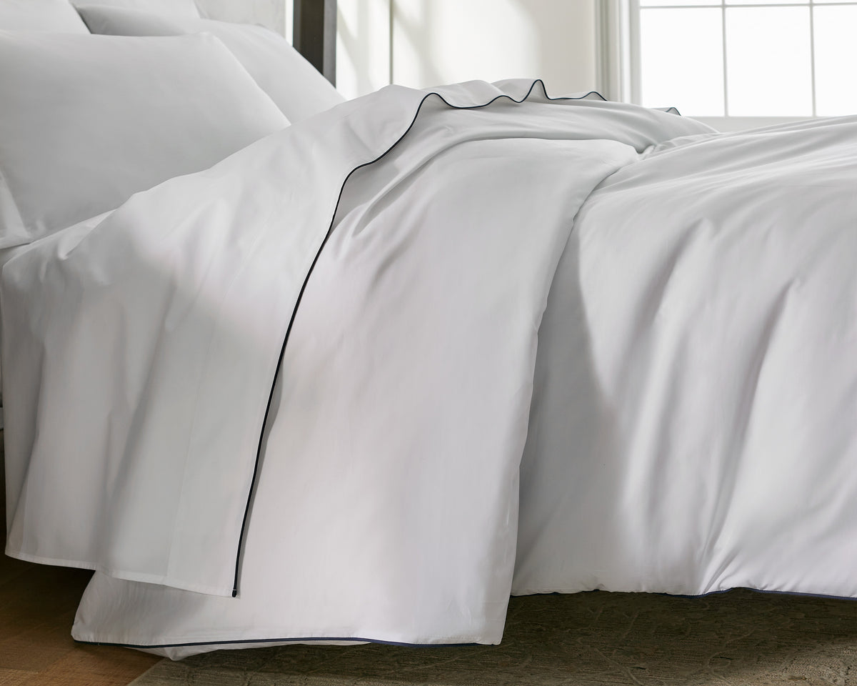 Close-up of pristine white percale cotton sheets